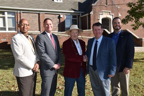 dignitaries in front of school include eric terrell, robby parker, Mr. Fautch, Jamie Golliver, Tim Holtcamp 